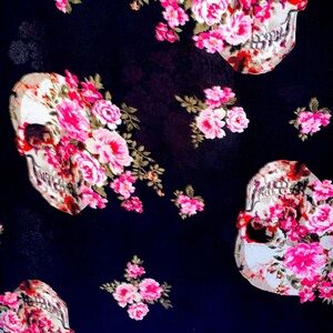 Torrid  plink skull and flowers Ragland tee